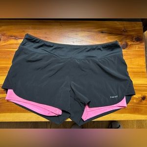 Athletic shorts with spandex shorts underneath